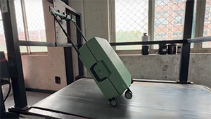 Prueba de rendimiento de las ruedas de la maleta